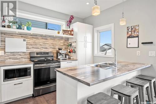 418 Kloppenburg Street, Saskatoon, SK - Indoor Photo Showing Kitchen With Double Sink