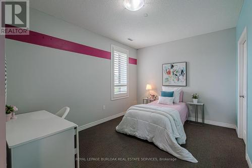 216 - 33 Whitmer Street, Milton (Scott), ON - Indoor Photo Showing Bedroom