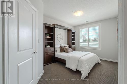 216 - 33 Whitmer Street, Milton (Scott), ON - Indoor Photo Showing Bedroom