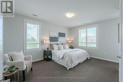 216 - 33 Whitmer Street, Milton (Scott), ON - Indoor Photo Showing Bedroom