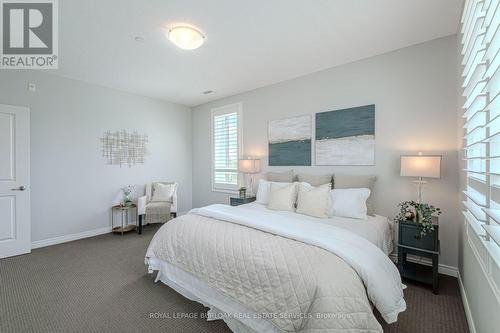 216 - 33 Whitmer Street, Milton (Scott), ON - Indoor Photo Showing Bedroom