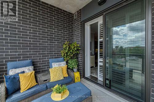 216 - 33 Whitmer Street, Milton, ON - Outdoor With Balcony With Exterior