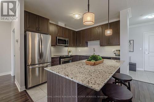 216 - 33 Whitmer Street, Milton (Scott), ON - Indoor Photo Showing Kitchen With Upgraded Kitchen