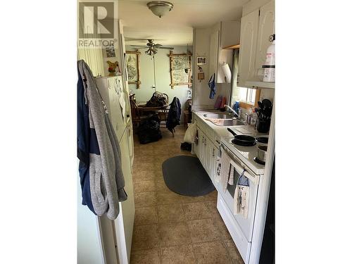 61 3889 Muller Avenue, Terrace, BC - Indoor Photo Showing Kitchen With Double Sink