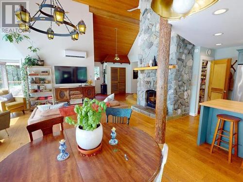 12335 Scotch Fir Point Road, Powell River, BC - Indoor Photo Showing Dining Room With Fireplace