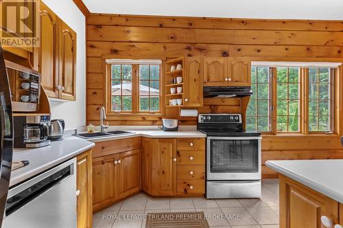 9936 Ontario Street, Lambton Shores (Port Franks), ON - Indoor Photo Showing Kitchen With Double Sink