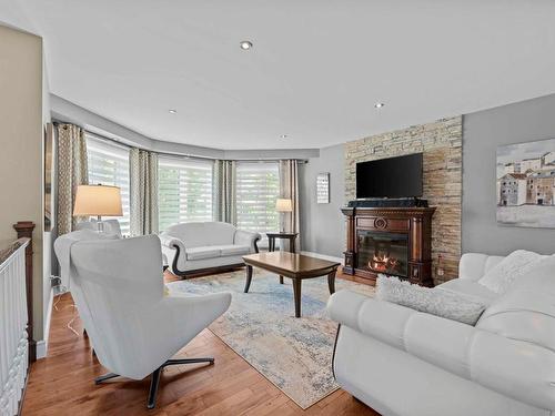 Salon - 3495 103E Avenue, Shawinigan, QC - Indoor Photo Showing Living Room With Fireplace