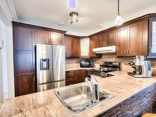 Cuisine - 6437 Boul. Des Laurentides, Laval (Auteuil), QC - Indoor Photo Showing Kitchen With Double Sink