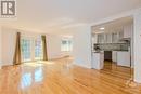 Sun filled main level with gleaming hardwood floor - 106 Mcclellan Road, Ottawa, ON  - Indoor Photo Showing Kitchen 