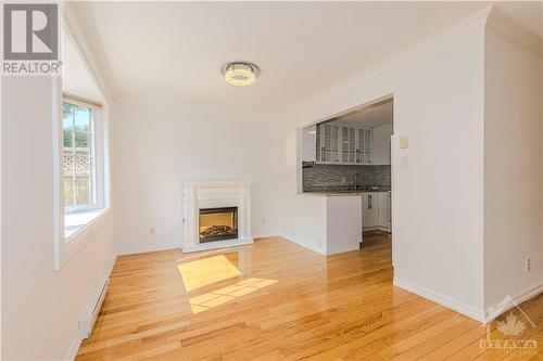 106 Mcclellan Road, Ottawa, ON - Indoor Photo Showing Living Room With Fireplace