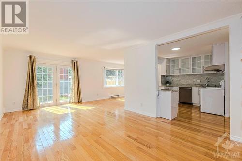 Sun filled main level with gleaming hardwood floor - 106 Mcclellan Road, Ottawa, ON - Indoor Photo Showing Kitchen