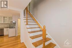 Elegant Hardwood staircase leading to the 2nd level - 