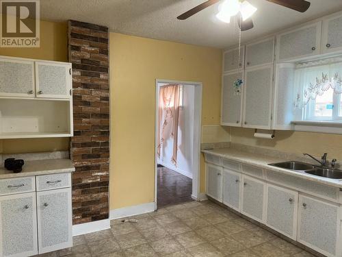 1889 Bowser  Street, Trail, BC - Indoor Photo Showing Kitchen With Double Sink