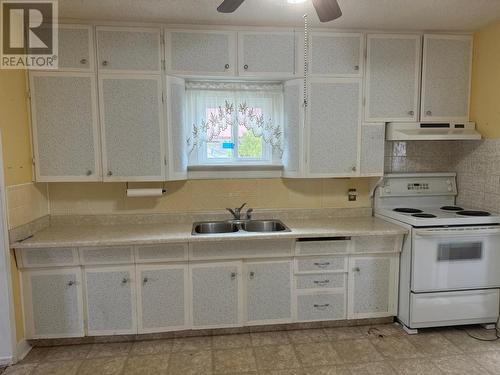 1889 Bowser  Street, Trail, BC - Indoor Photo Showing Kitchen With Double Sink