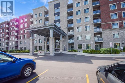 316 - 830 Megson Terrace, Milton (Willmott), ON - Outdoor With Balcony With Facade