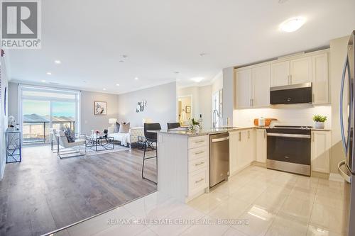 316 - 830 Megson Terrace, Milton (Willmott), ON - Indoor Photo Showing Kitchen With Upgraded Kitchen