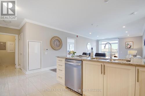 316 - 830 Megson Terrace, Milton (Willmott), ON - Indoor Photo Showing Kitchen With Double Sink