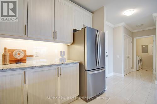 316 - 830 Megson Terrace, Milton (Willmott), ON - Indoor Photo Showing Kitchen