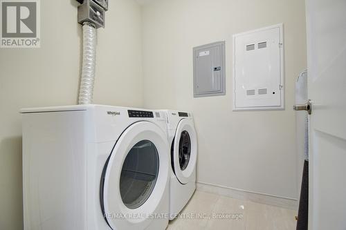 316 - 830 Megson Terrace, Milton (Willmott), ON - Indoor Photo Showing Laundry Room