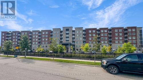 316 - 830 Megson Terrace, Milton (Willmott), ON - Outdoor With Balcony With Facade