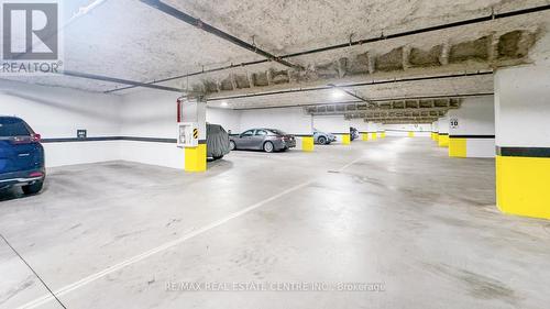 316 - 830 Megson Terrace, Milton, ON - Indoor Photo Showing Garage