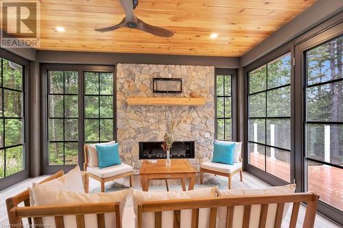 1301 Nordic Road, Arden, ON - Indoor Photo Showing Other Room With Fireplace