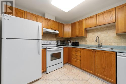 304 - 138 Hibernia Street, Cobourg, ON - Indoor Photo Showing Kitchen With Double Sink