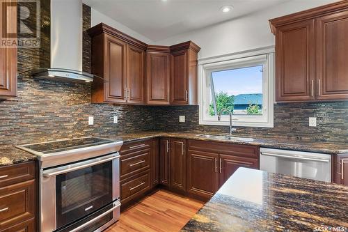 1530 Pohorecky Court, Saskatoon, SK - Indoor Photo Showing Kitchen With Stainless Steel Kitchen With Double Sink With Upgraded Kitchen