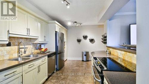 912 - 92 Church Street S, Ajax, ON - Indoor Photo Showing Kitchen With Double Sink