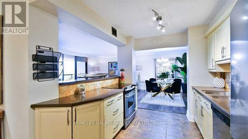 912 - 92 Church Street S, Ajax, ON - Indoor Photo Showing Kitchen With Double Sink