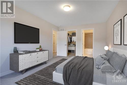 Images provided are to showcase builder finishes. Some photos have been virtually staged. Primary bedroom with ensuite - 616 Bronze Copper Crescent, Ottawa, ON - Indoor Photo Showing Bedroom