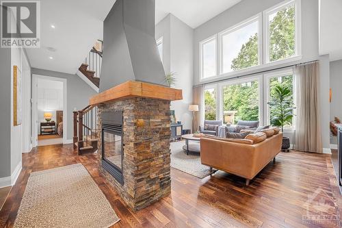 37 Moore Street, Richmond, ON - Indoor Photo Showing Living Room With Fireplace