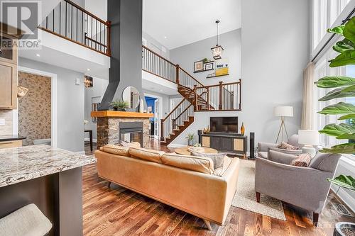 37 Moore Street, Richmond, ON - Indoor Photo Showing Living Room With Fireplace