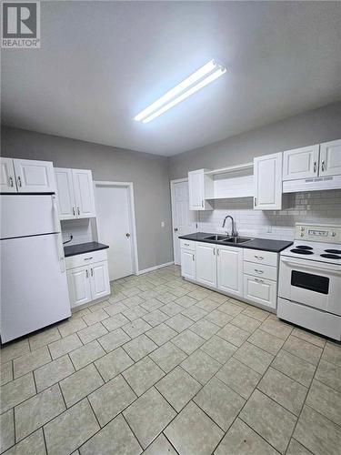 144 John Street, Moncton, NB - Indoor Photo Showing Kitchen With Double Sink