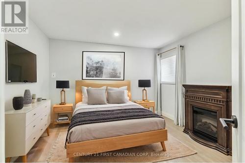 Virtually Staged - Currently office - 6 Anderson Court, Halton Hills (Georgetown), ON - Indoor Photo Showing Bedroom With Fireplace