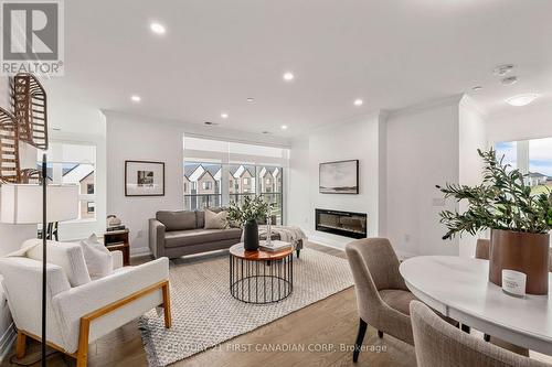 315 - 1975 Fountain Grass Drive, London, ON - Indoor Photo Showing Living Room With Fireplace