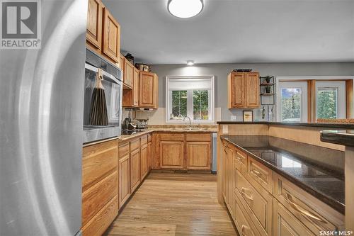 14 Mccully Crescent, Saskatoon, SK - Indoor Photo Showing Kitchen With Double Sink