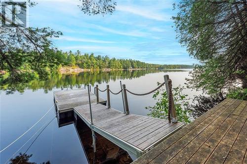 Dock to 249' pristine waterfront. - 1325 Nordic Road, Arden, ON - Outdoor With Body Of Water With View