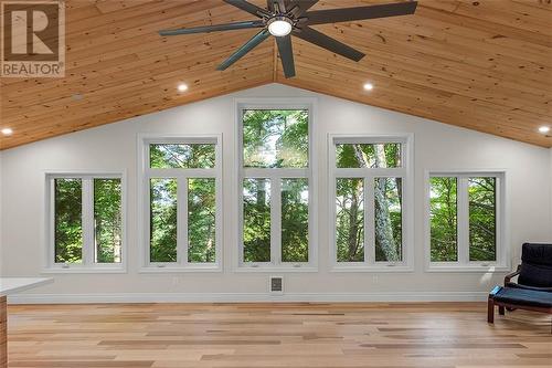 The "tree house" view towards the water. - 1325 Nordic Road, Arden, ON - Indoor Photo Showing Other Room