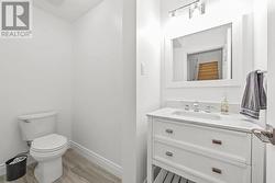 Lower level 2pc bathroom. - 