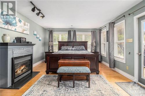 92 Jasper Avenue, Smiths Falls, ON - Indoor Photo Showing Bedroom With Fireplace