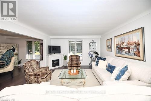 47 Monarch Park Drive, St. Catharines, ON - Indoor Photo Showing Living Room With Fireplace