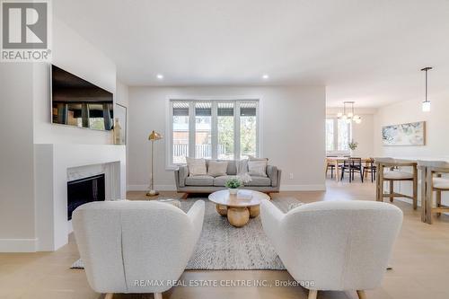 6 - 7966 Fallon Drive, London, ON - Indoor Photo Showing Living Room With Fireplace