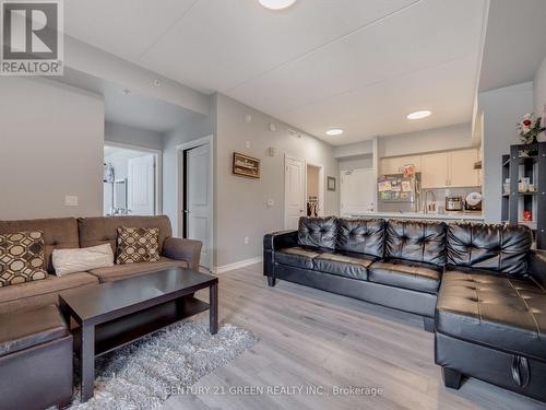 304 - 640 Sauve Street, Milton (Beaty), ON - Indoor Photo Showing Living Room