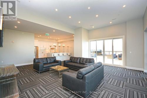 304 - 640 Sauve Street, Milton (Beaty), ON - Indoor Photo Showing Living Room