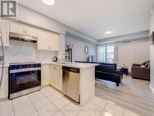 304 - 640 Sauve Street, Milton (Beaty), ON - Indoor Photo Showing Kitchen With Stainless Steel Kitchen