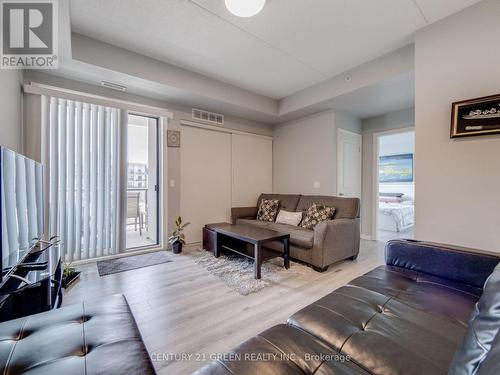 304 - 640 Sauve Street, Milton (Beaty), ON - Indoor Photo Showing Living Room