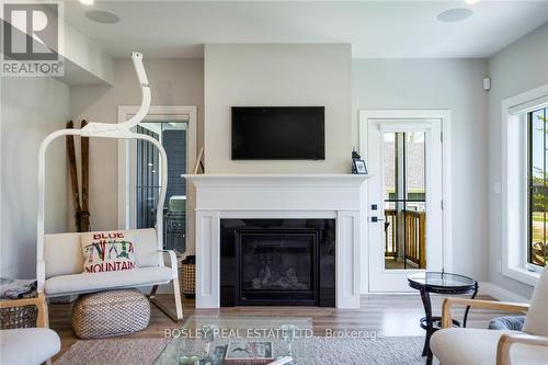 104 Black Willow Crescent, Blue Mountains, ON - Indoor Photo Showing Living Room With Fireplace