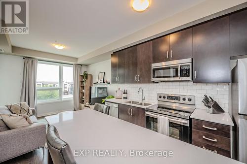 304 - 1105 Leger Way, Milton (Ford), ON - Indoor Photo Showing Kitchen With Stainless Steel Kitchen With Double Sink