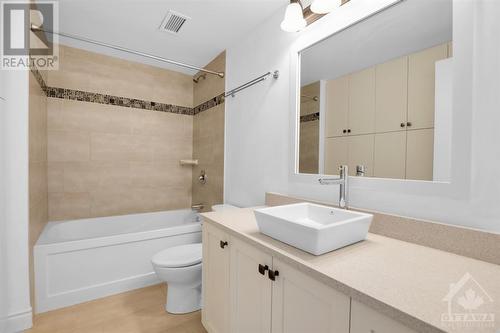 Main updated bath with lots of cabinetry - 40 Boteler Street Unit#604, Ottawa, ON - Indoor Photo Showing Bathroom